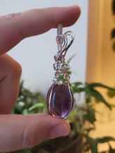 Load image into Gallery viewer, Amethyst wrapped in flowy Silver