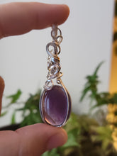 Load image into Gallery viewer, Amethyst wrapped in flowy Silver