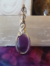 Load image into Gallery viewer, Amethyst wrapped in flowy Silver
