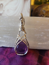 Load image into Gallery viewer, Amethyst wrapped in Silver