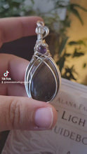 Load and play video in Gallery viewer, Purple Labradorite wrapped in Silver
