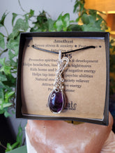 Load image into Gallery viewer, Amethyst wrapped in flowy Silver
